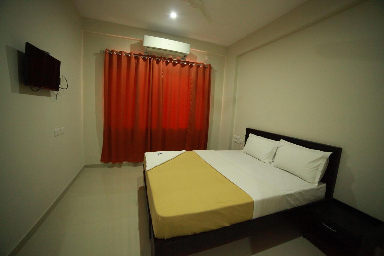 Hotel Riva Residency Palakkad Pokoj fotografie